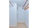 Walk-in closet with hanging rods and shelving at 4910 Bay Ne St # 109, St Petersburg, FL 33703