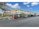 Building's exterior showcasing parking and landscaping at 4910 Bay Ne St # 109, St Petersburg, FL 33703
