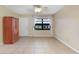 Living room with tile floors, ceiling fan and window at 4910 Bay Ne St # 109, St Petersburg, FL 33703