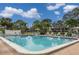 Inviting community pool with lounge chairs at 4910 Bay Ne St # 109, St Petersburg, FL 33703