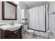 Clean bathroom with updated vanity and shower at 5176 Salmon Se Dr # B, St Petersburg, FL 33705