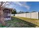 Large backyard with fenced perimeter at 712 Bowsprit Pl, Palm Harbor, FL 34685