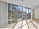 Sunroom with sliding doors offering scenic views at 90 S Highland Ave # 102, Tarpon Springs, FL 34689