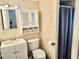 Bathroom with a toilet, sink, and shower at 9790 66Th N St # 312, Pinellas Park, FL 33782
