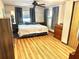 Spacious bedroom with ample closet space and wood-look flooring at 9790 66Th N St # 312, Pinellas Park, FL 33782