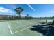 Expansive pickleball court with surrounding landscape at 7069 Key Haven Rd # 504, Seminole, FL 33777