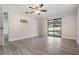Bedroom with sliding glass doors and pool view at 11201 Mercedes St, Spring Hill, FL 34609