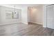 Bright dining room features wood-look floors and a chandelier at 11201 Mercedes St, Spring Hill, FL 34609