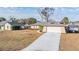 Single-story house with attached garage and fenced yard at 11201 Mercedes St, Spring Hill, FL 34609