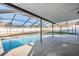 Inviting screened pool area, perfect for relaxation and entertainment at 11201 Mercedes St, Spring Hill, FL 34609