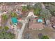 Aerial view of house, pool, and shed at 12404 Dolquieb Ln, Weeki Wachee, FL 34614