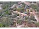 Aerial view of property showing home and land at 12404 Dolquieb Ln, Weeki Wachee, FL 34614