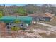 Property features home, RV cover and large lot at 12404 Dolquieb Ln, Weeki Wachee, FL 34614