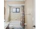 Bathroom with tub shower combo at 12404 Dolquieb Ln, Weeki Wachee, FL 34614
