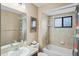 Clean bathroom with tub, shower, and updated vanity at 12404 Dolquieb Ln, Weeki Wachee, FL 34614