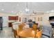 Charming dining area with wood table and access to backyard at 12404 Dolquieb Ln, Weeki Wachee, FL 34614