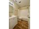 Bathroom with shower/tub combo and white vanity at 2066 Sunset Point Rd # 97, Clearwater, FL 33765