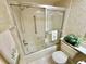 Clean bathroom with shower/tub and toilet at 2119 Elm St # 101, Dunedin, FL 34698