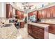 Spacious kitchen with granite countertops and stainless steel appliances at 2749 Bent Leaf Dr, Valrico, FL 33594