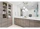 Spa-like bathroom with double vanity and storage cabinet at 301 1St S St # 1002, St Petersburg, FL 33701