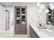 Spa-like bathroom with double vanity and large storage cabinet at 301 1St S St # 1002, St Petersburg, FL 33701