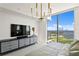 Bright bedroom featuring a large TV and city views at 301 1St S St # 1002, St Petersburg, FL 33701