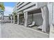 Relaxing cabanas with comfortable loungers and curtains at 301 1St S St # 1002, St Petersburg, FL 33701
