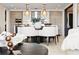 Modern dining area with large table and white chairs at 301 1St S St # 1002, St Petersburg, FL 33701