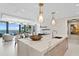 Modern kitchen with marble countertops and stainless steel appliances at 301 1St S St # 1002, St Petersburg, FL 33701