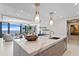 Modern kitchen with marble island and high-end appliances at 301 1St S St # 1002, St Petersburg, FL 33701