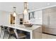 Modern kitchen with marble countertops and a large island at 301 1St S St # 1002, St Petersburg, FL 33701