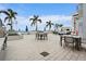 Outdoor patio with seating, grills, and ocean views at 301 1St S St # 1002, St Petersburg, FL 33701