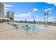 Resort-style pool with plenty of lounge chairs at 301 1St S St # 1002, St Petersburg, FL 33701