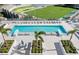 Resort-style pool with lounge chairs and lush landscaping at 301 1St S St # 1002, St Petersburg, FL 33701