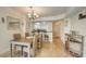 Bright dining area with table, chairs and kitchen access at 4516 Seagull Dr # 419, New Port Richey, FL 34652