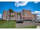 Building exterior with parking and landscaping at 4516 Seagull Dr # 419, New Port Richey, FL 34652