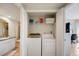 Convenient laundry closet with washer and dryer at 4516 Seagull Dr # 419, New Port Richey, FL 34652