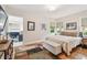 Bright bedroom with hardwood floors and built-in office at 487 9Th N Ave, St Petersburg, FL 33701