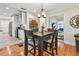Elegant dining area with hardwood floors and kitchen access at 487 9Th N Ave, St Petersburg, FL 33701
