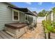 Relaxing patio with hot tub, seating area, and lush landscaping at 487 9Th N Ave, St Petersburg, FL 33701