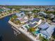Aerial view of waterfront home with pool and dock at 5614 Seagrass Pl, Apollo Beach, FL 33572