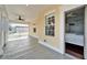 Private balcony with ceiling fan and neighborhood view at 5614 Seagrass Pl, Apollo Beach, FL 33572