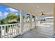 Expansive balcony with white railing and neighborhood views at 5614 Seagrass Pl, Apollo Beach, FL 33572