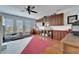 Spacious bedroom with built-in cabinets and hardwood floors at 5614 Seagrass Pl, Apollo Beach, FL 33572