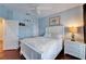 Bright bedroom with white furniture and a ceiling fan at 5614 Seagrass Pl, Apollo Beach, FL 33572