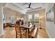Spacious dining room with hardwood floors and bench seating at 5614 Seagrass Pl, Apollo Beach, FL 33572