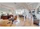 Spacious dining room with hardwood floors and large windows at 5614 Seagrass Pl, Apollo Beach, FL 33572