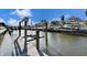 Private boat dock with lift; perfect for water access at 5614 Seagrass Pl, Apollo Beach, FL 33572