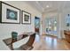 Bright and airy entryway with hardwood floors at 5614 Seagrass Pl, Apollo Beach, FL 33572