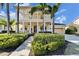 Two-story house with front porch and landscaping at 5614 Seagrass Pl, Apollo Beach, FL 33572